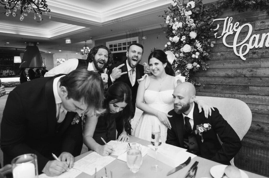 signing-marriage-license-at-wedding-reception