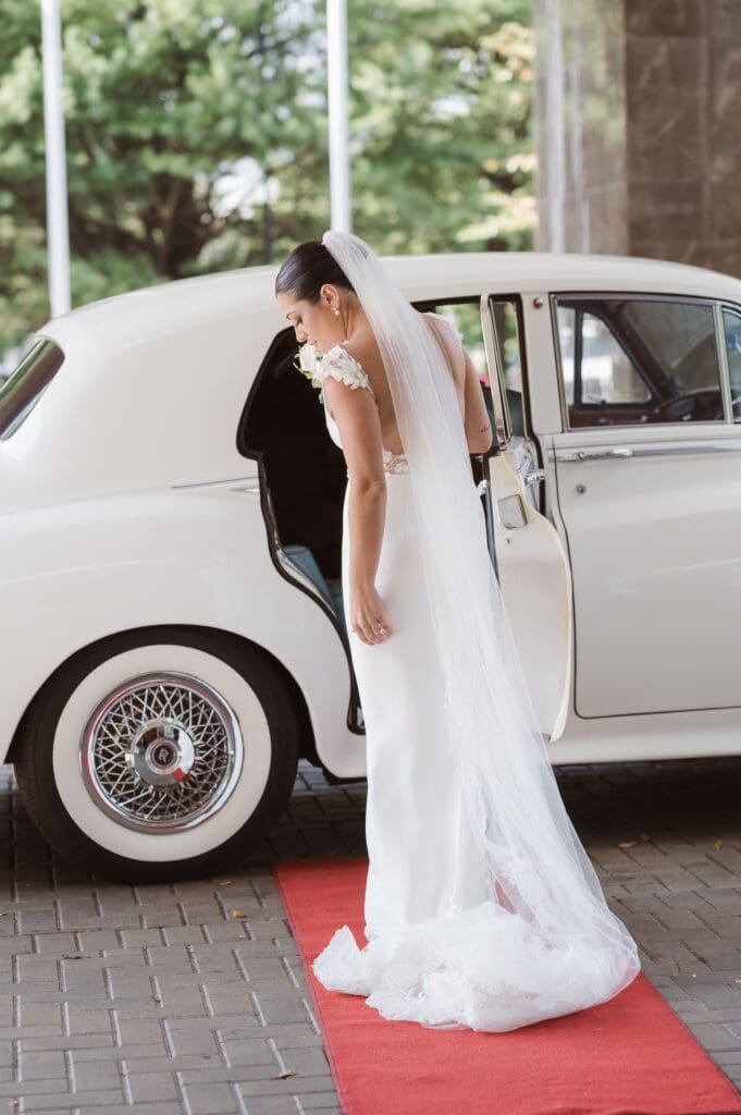 bride-on-wedding-day-with-rolls-royce