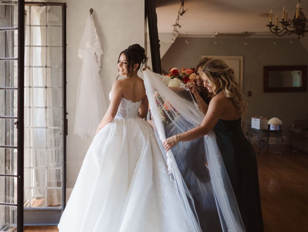 bride-getting-ready-in-bridal-suite-at-pleasantdale-chateau-nj-wedding-photos-by-photographer-suess-moments