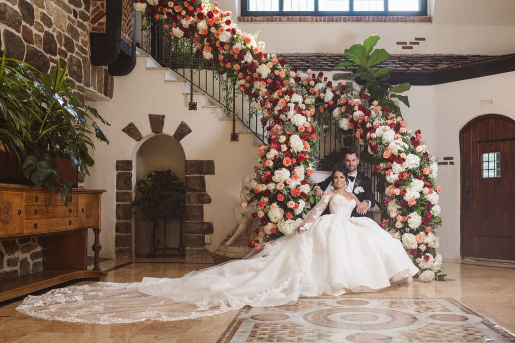 staircase-sitting-down-photo-at-pleasantdale-chateau-nj-wedding-photos-by-photographer-suess-moments