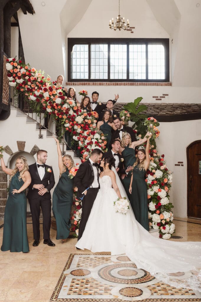 wedding-party-on-stairs-at-pleasantdale-chateau-nj-wedding-photos-by-photographer-suess-moments