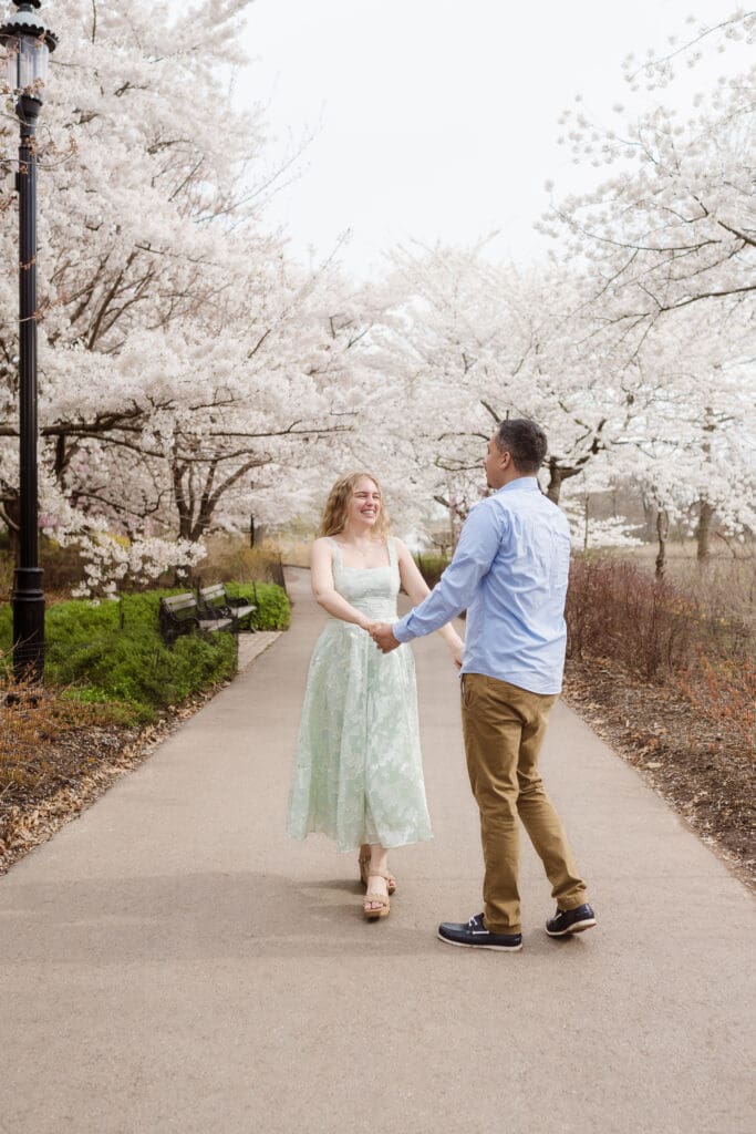 new-jersey-engagement-photos-with-cherry-blossoms-at-spring-branch-brook-park-suess-moments
