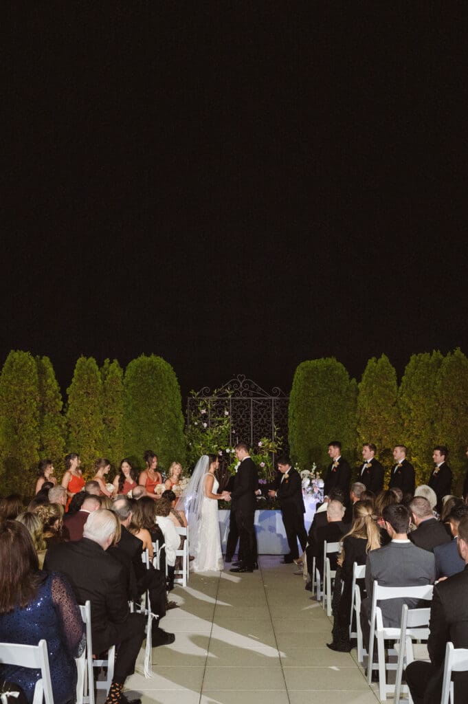 outdoor-night-ceremony-at-west-wing-palace-at-somserset-park-nj-by-suess-moments