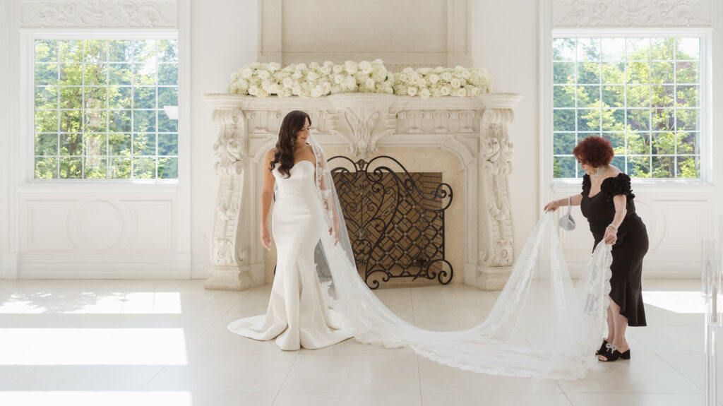 bride getting ready photos in the ceremony space at the estate at florentine gardens nj by suess moments photography