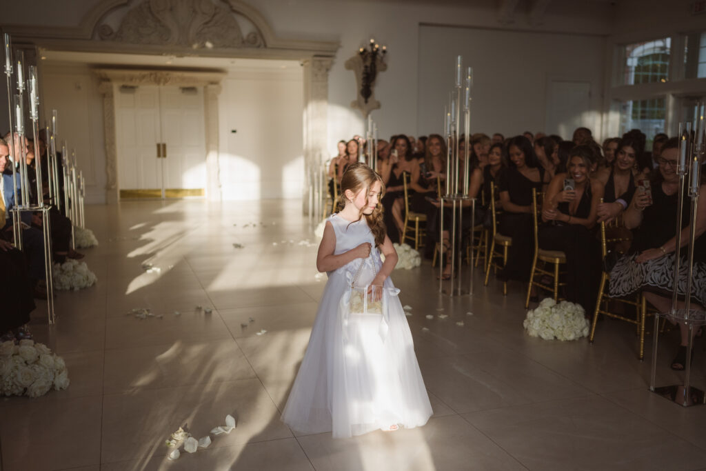 flower girl entrance at wedding ceremony