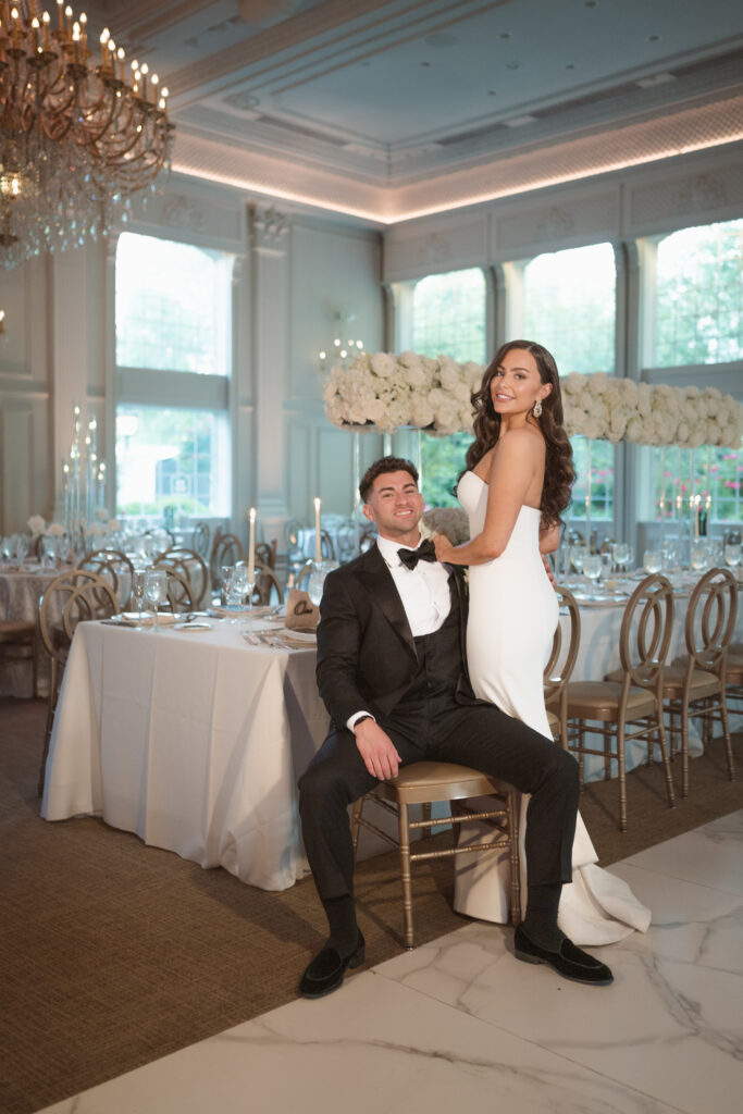 wedding reception bride and groom portrait sitting down by suess moments