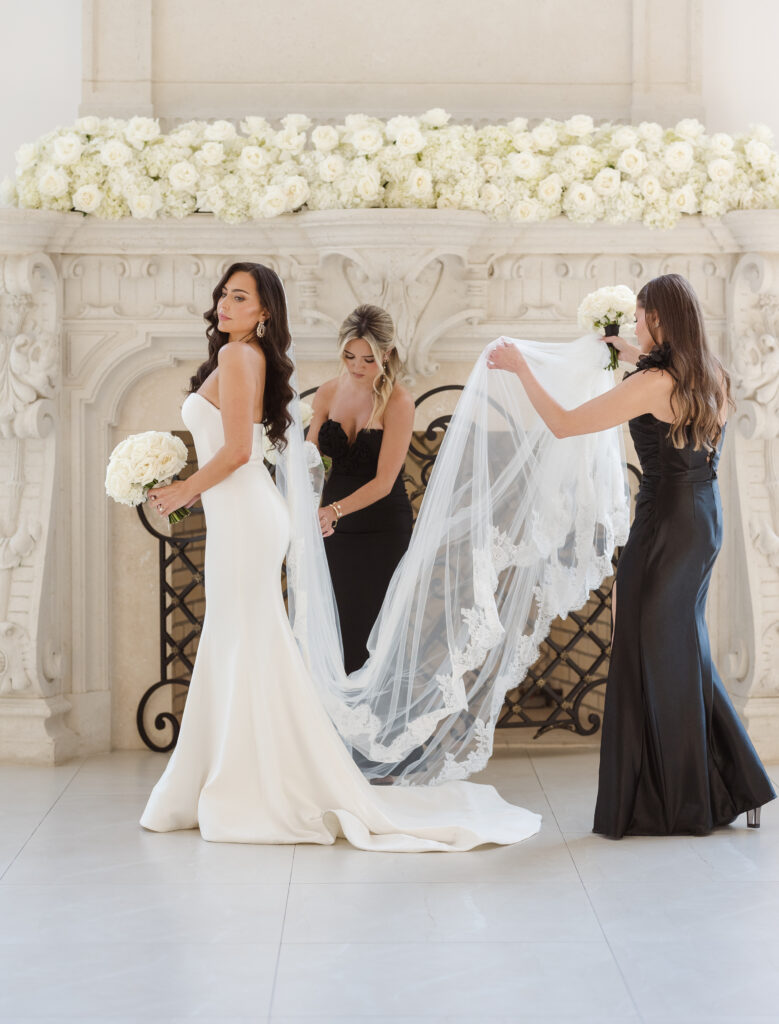 bride getting ready photos in the ceremony space at the estate at florentine gardens nj by suess moments photography