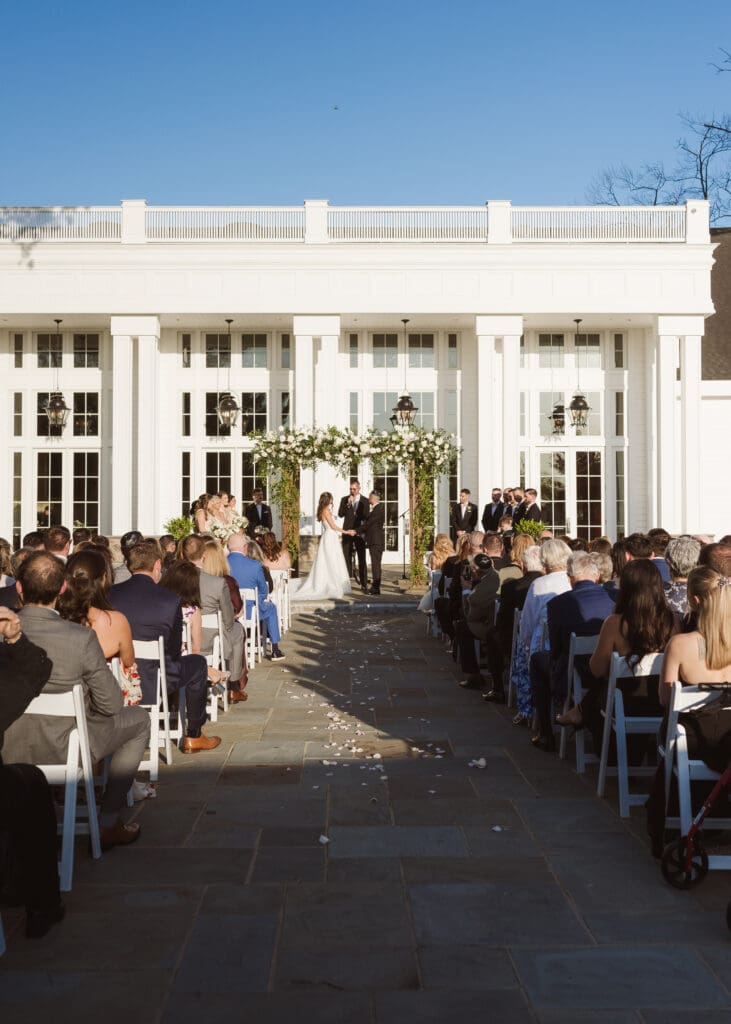 outdoor wedding ceremony at the ryland inn nj by suess moments photography