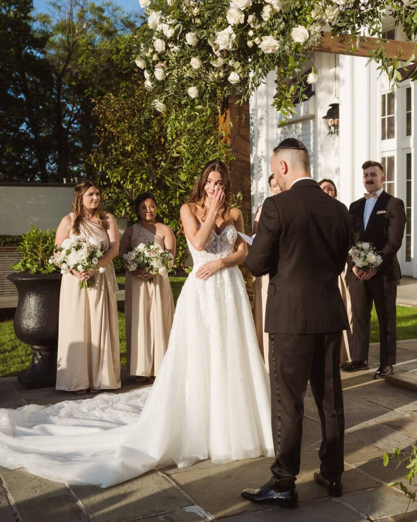 outdoor wedding ceremony at the ryland inn nj by suess moments photography