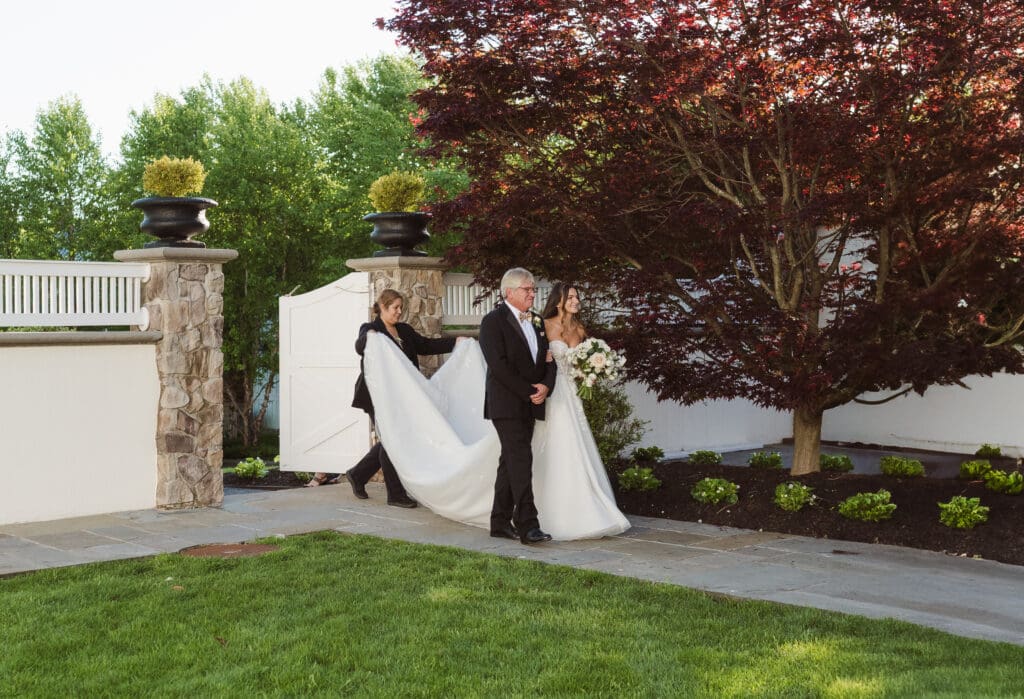 outdoor wedding ceremony at the ryland inn nj by suess moments photography