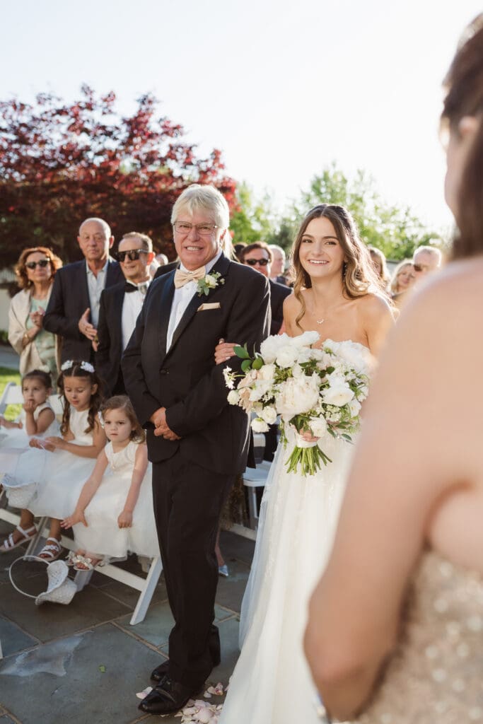 outdoor wedding ceremony at the ryland inn nj by suess moments photography