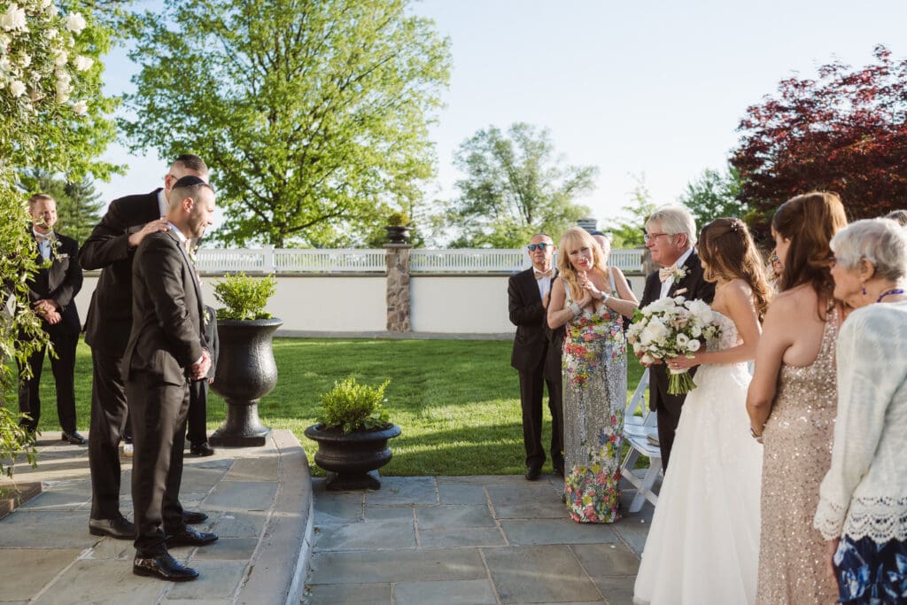 outdoor wedding ceremony at the ryland inn nj by suess moments photography