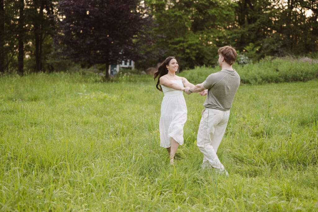 fun engagement photo pose dancing
