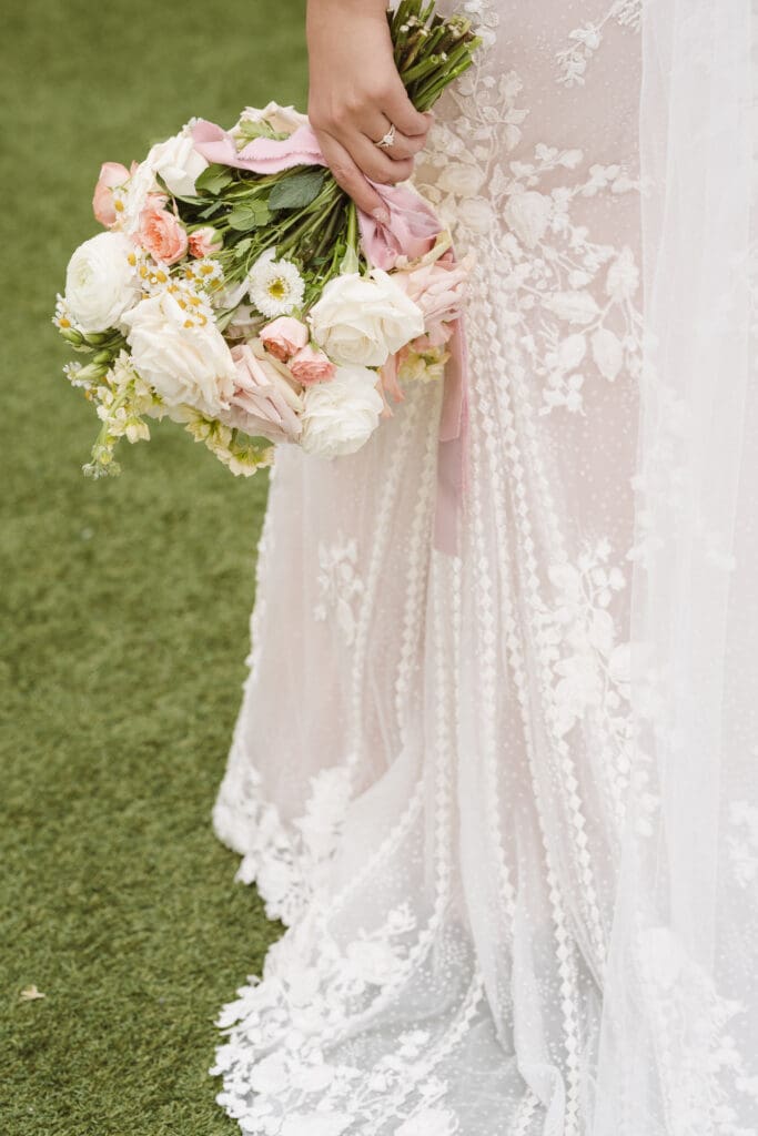 bride holding bouquet by sage and such in new jersey