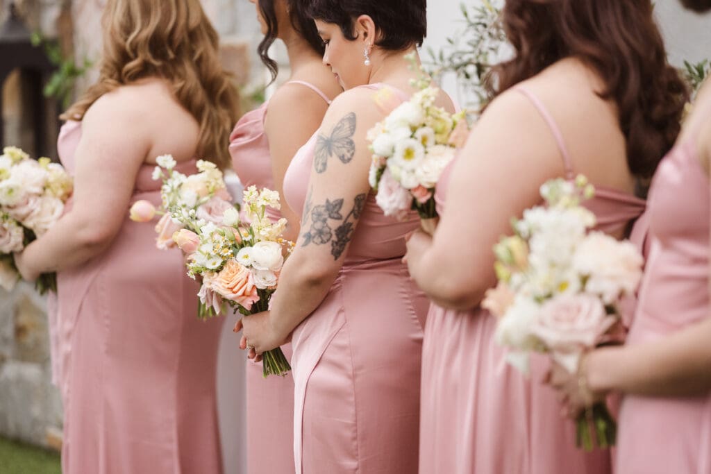 butterfly tattoos bridesmaids wearing pink