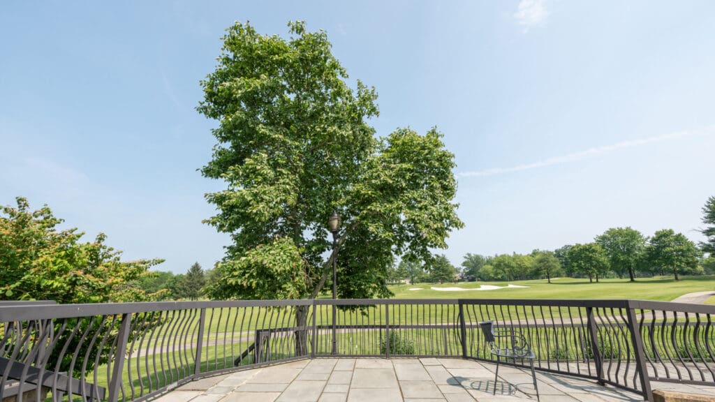 This is the outdoor patio overlooking the 18th hole outside the Beata House