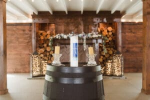 wedding ceremony in the barn at the hamilton manor nj