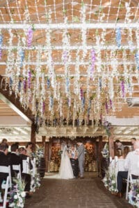 wedding ceremony in the barn at the hamilton manor nj