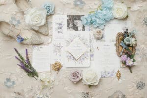 flatlay purple and blue wedding stationary