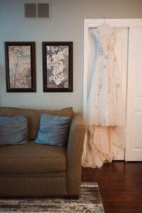 dress hanging up in bedroom