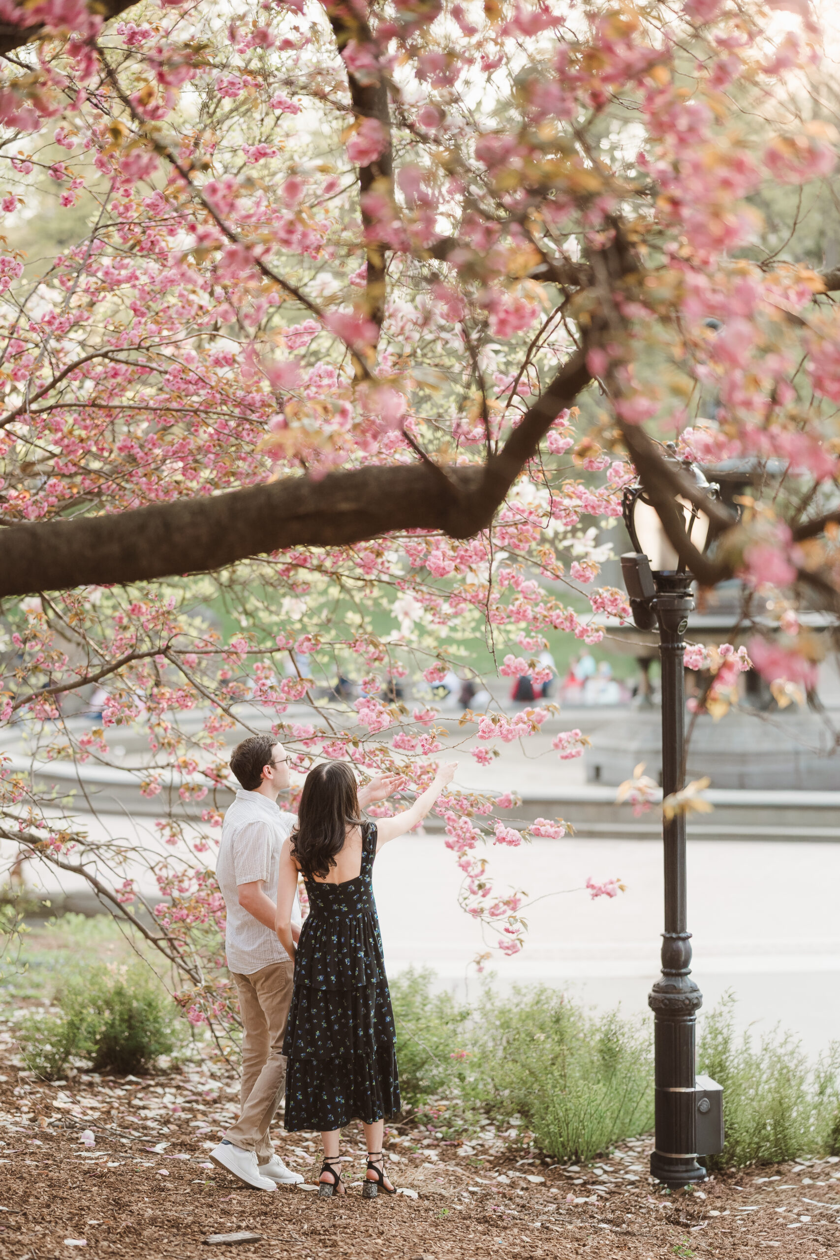 candid film like engagement photos in central park by nj wedding photographer