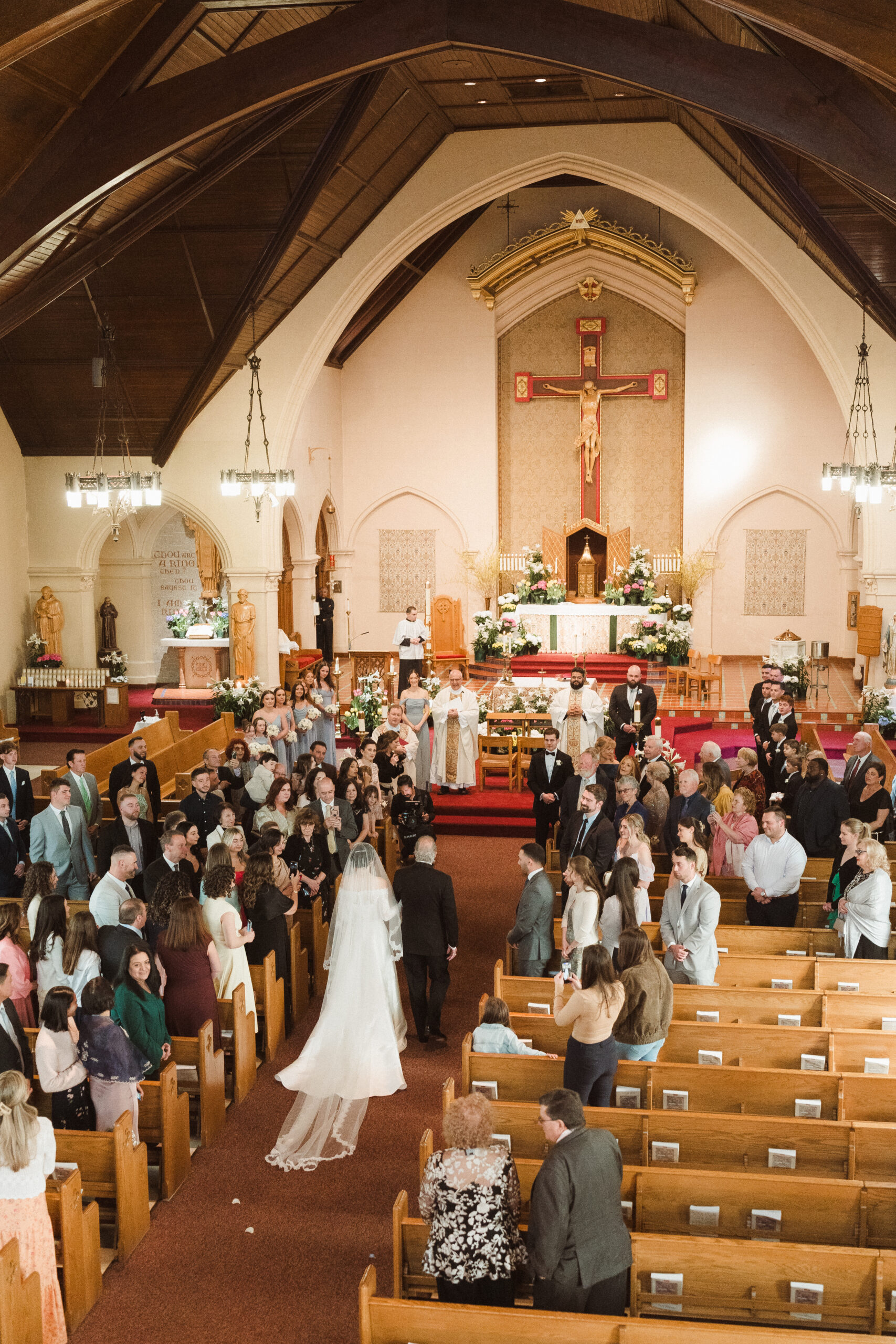 Wedding photos at the Immaculate Heart of Mary Church in Scarsdale, NY by a whimsical photographer based in New Jersey